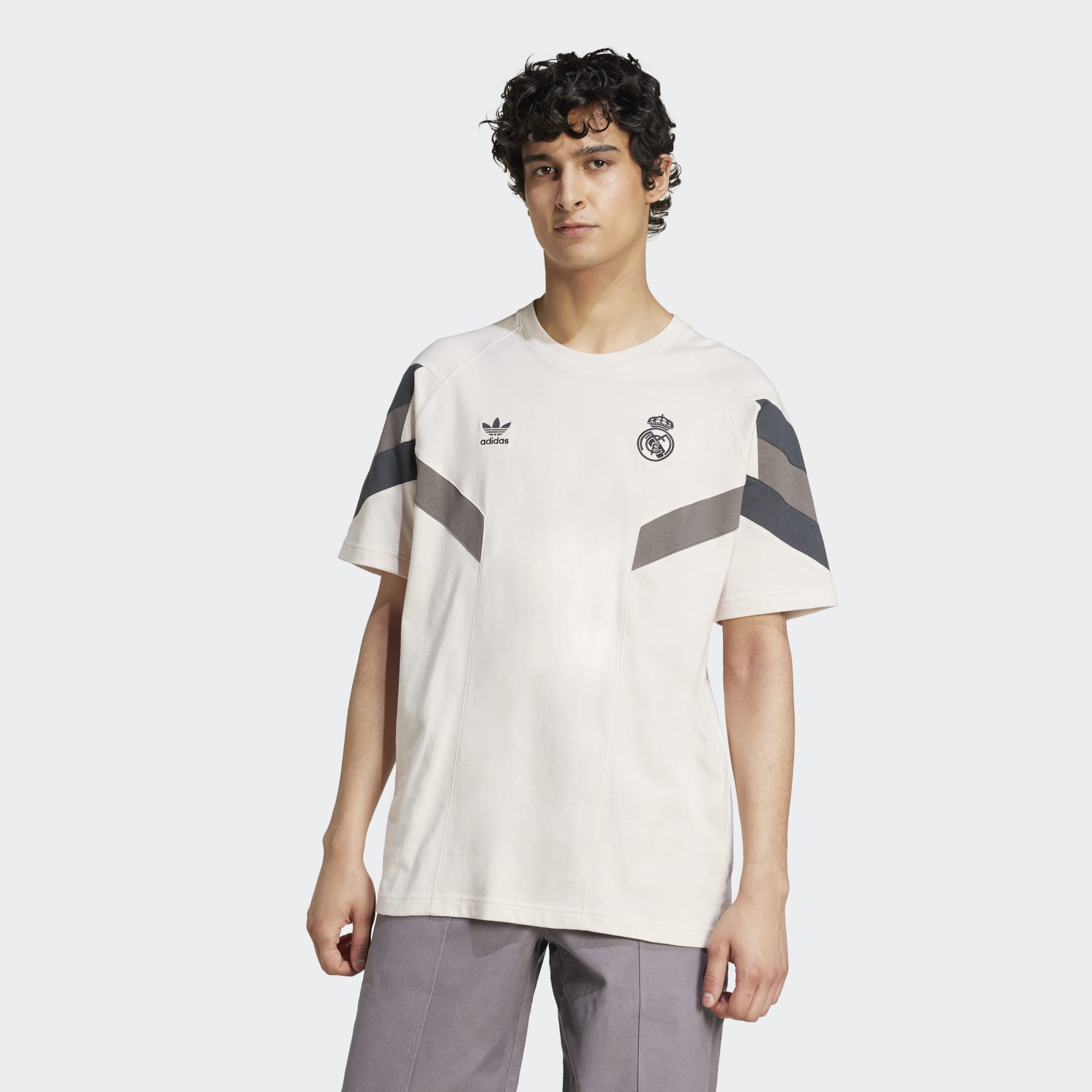 Model wearing Adidas Men's Real Madrid Originals Trefoil Tee - Front View with Trefoil Logo and Club Badge, Item Number IM7467